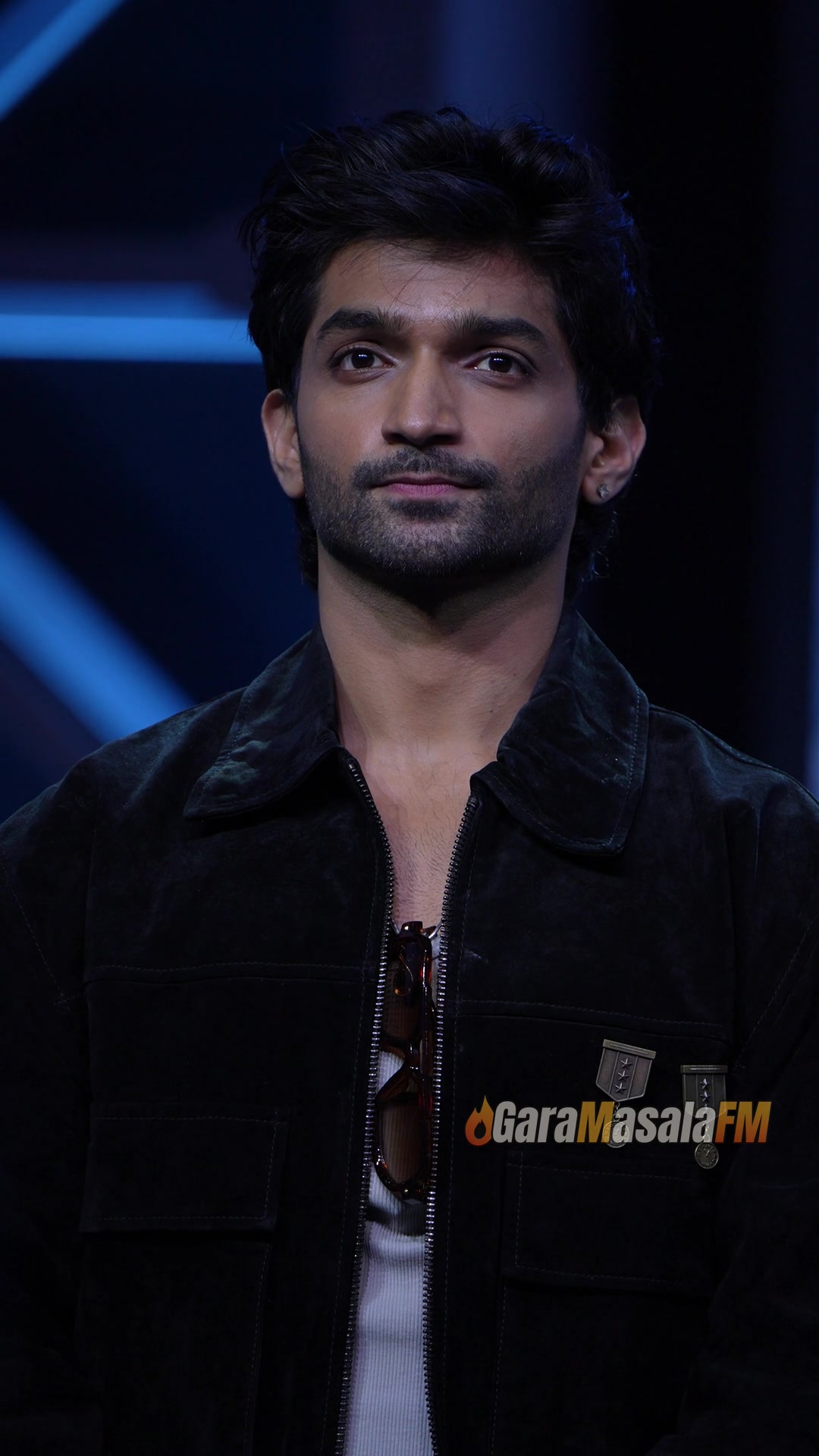 Arnav Bhasin photographed by the paparazzi at the shutter wall.