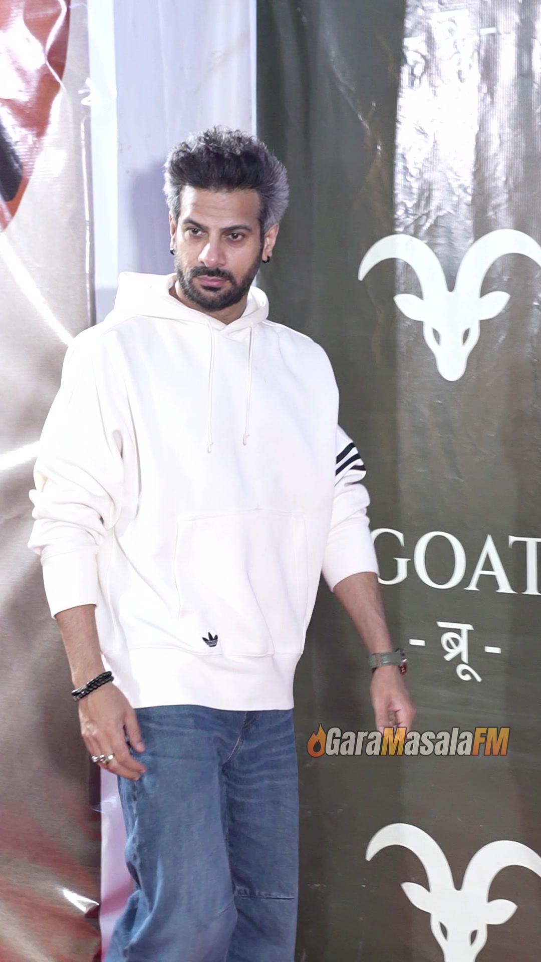Karan Veer Mehra photographed by paparazzi at the Goat Brew red carpet launch.