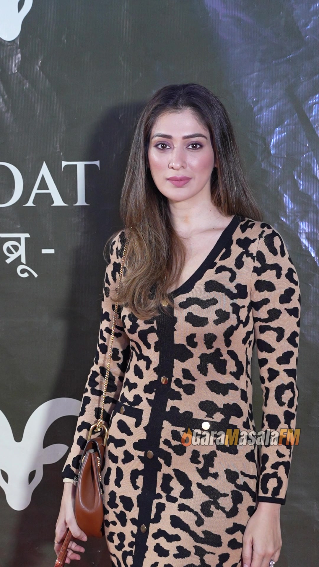 Raai Laxmi photographed by paparazzi at the red carpet launch of Goat Brew.