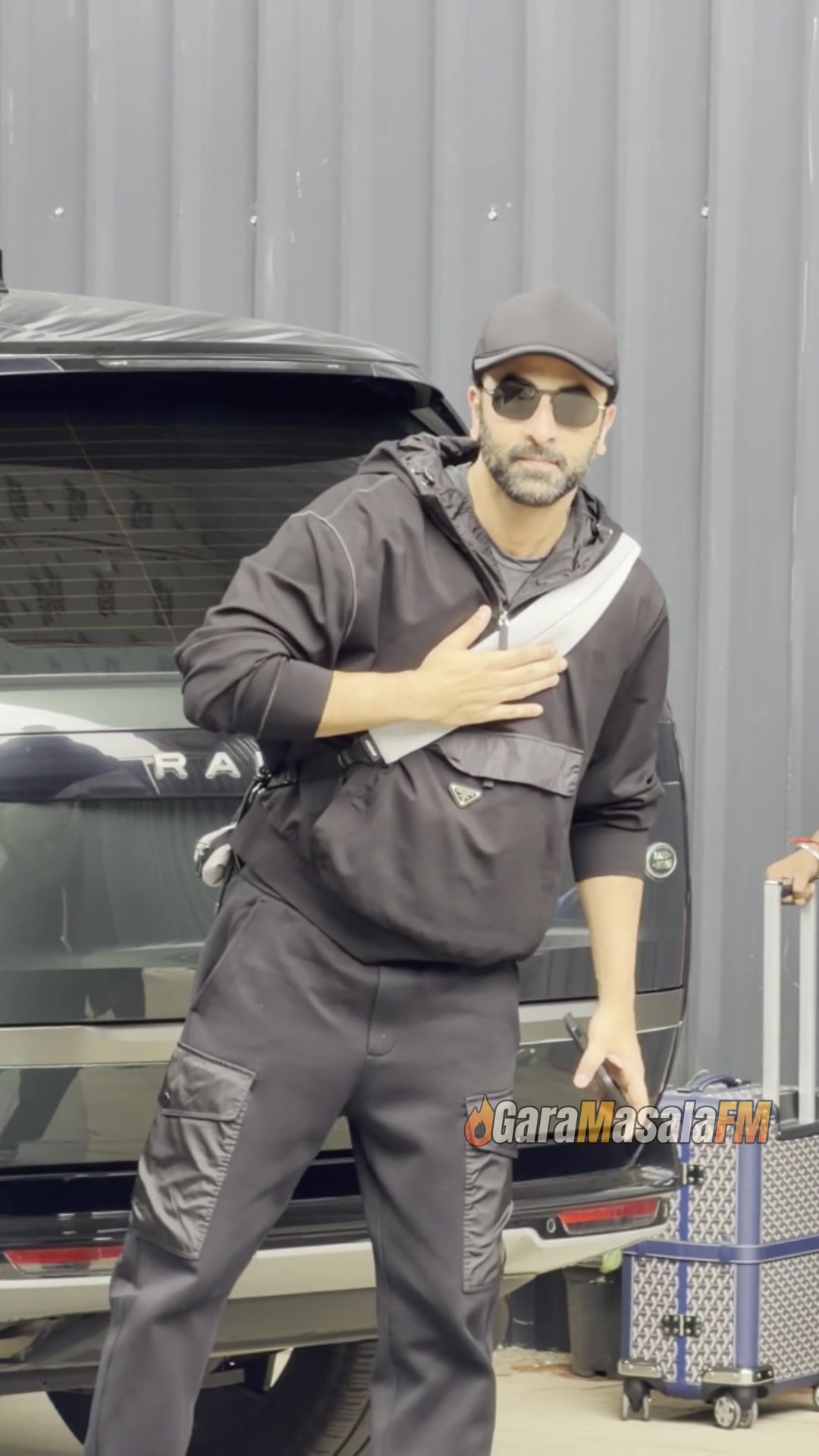 Ranbir Kapoor wearing sunglasses and black jacket