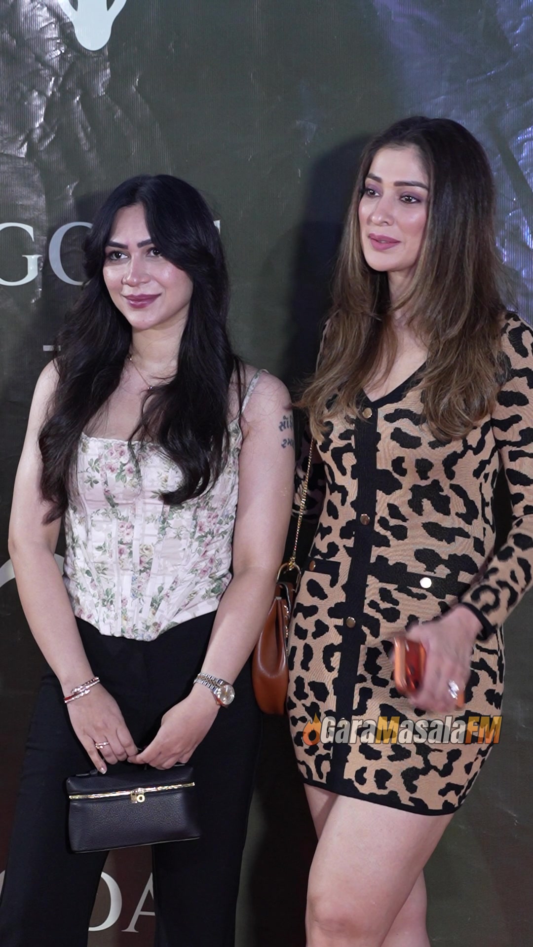 Vanessa Parmar and Raii Laxmi photographed by paparazzi at the red carpet launch of Goat Brew