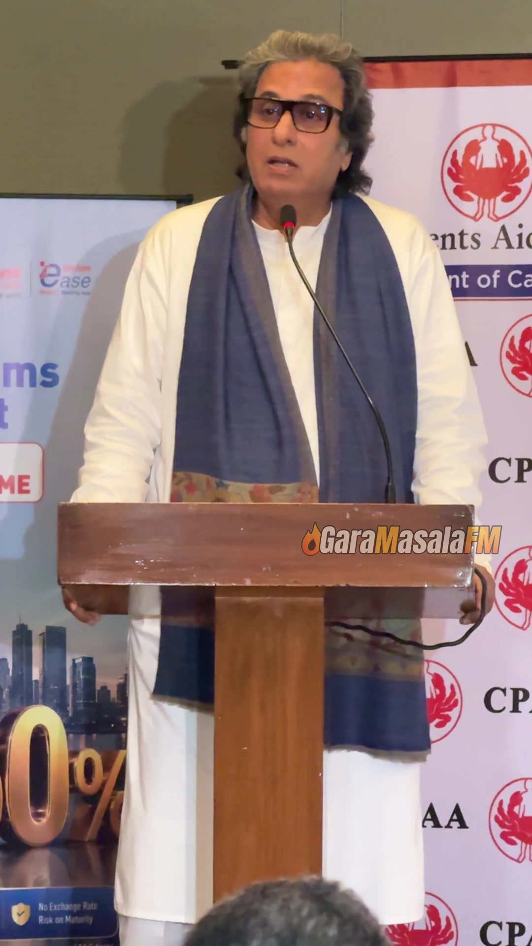 Talat Aziz speaking at the Khazana festival press conference, still from the video